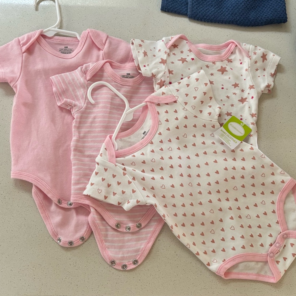 4 Pink / White Baby Onesies Set
